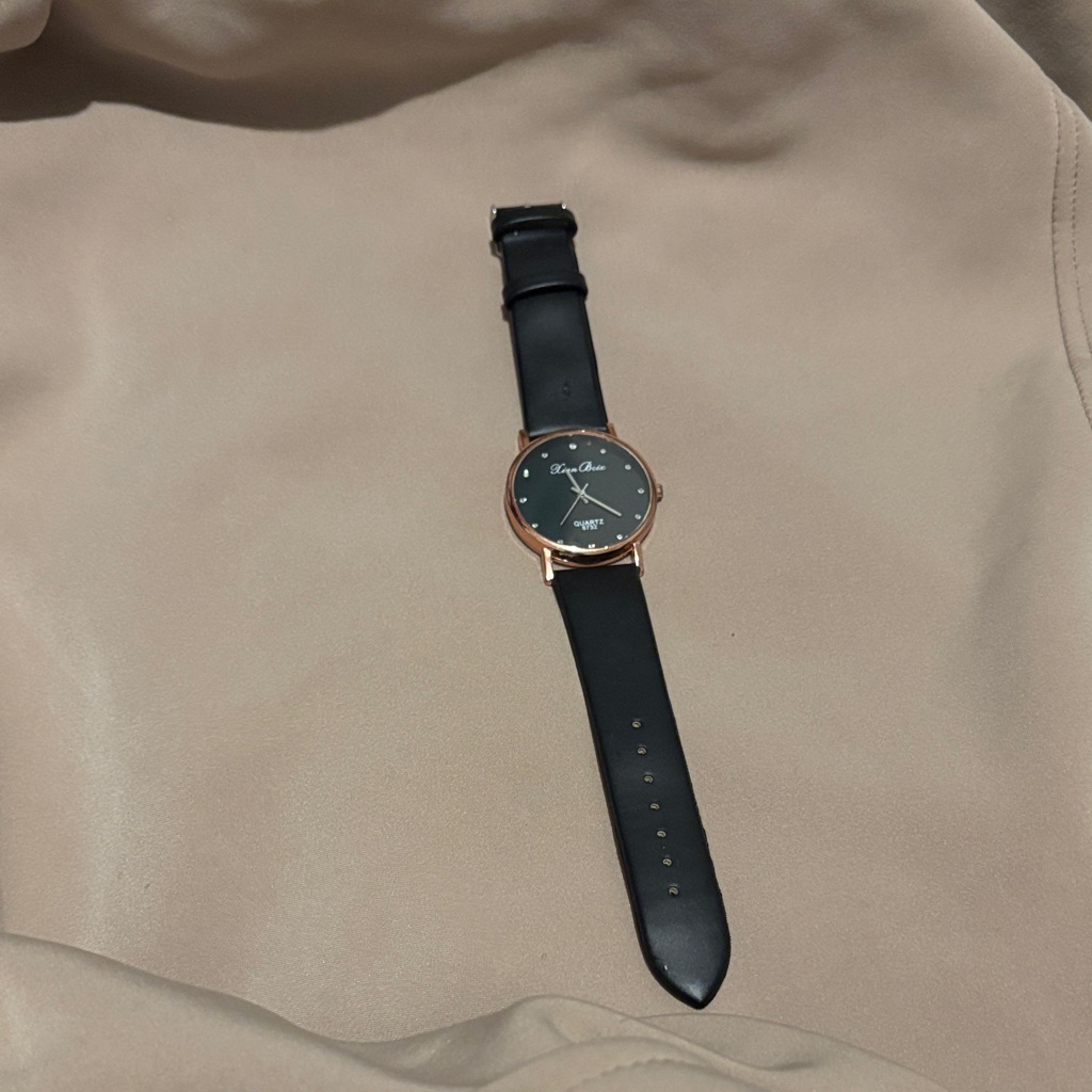 Black And Rose Gold Watch